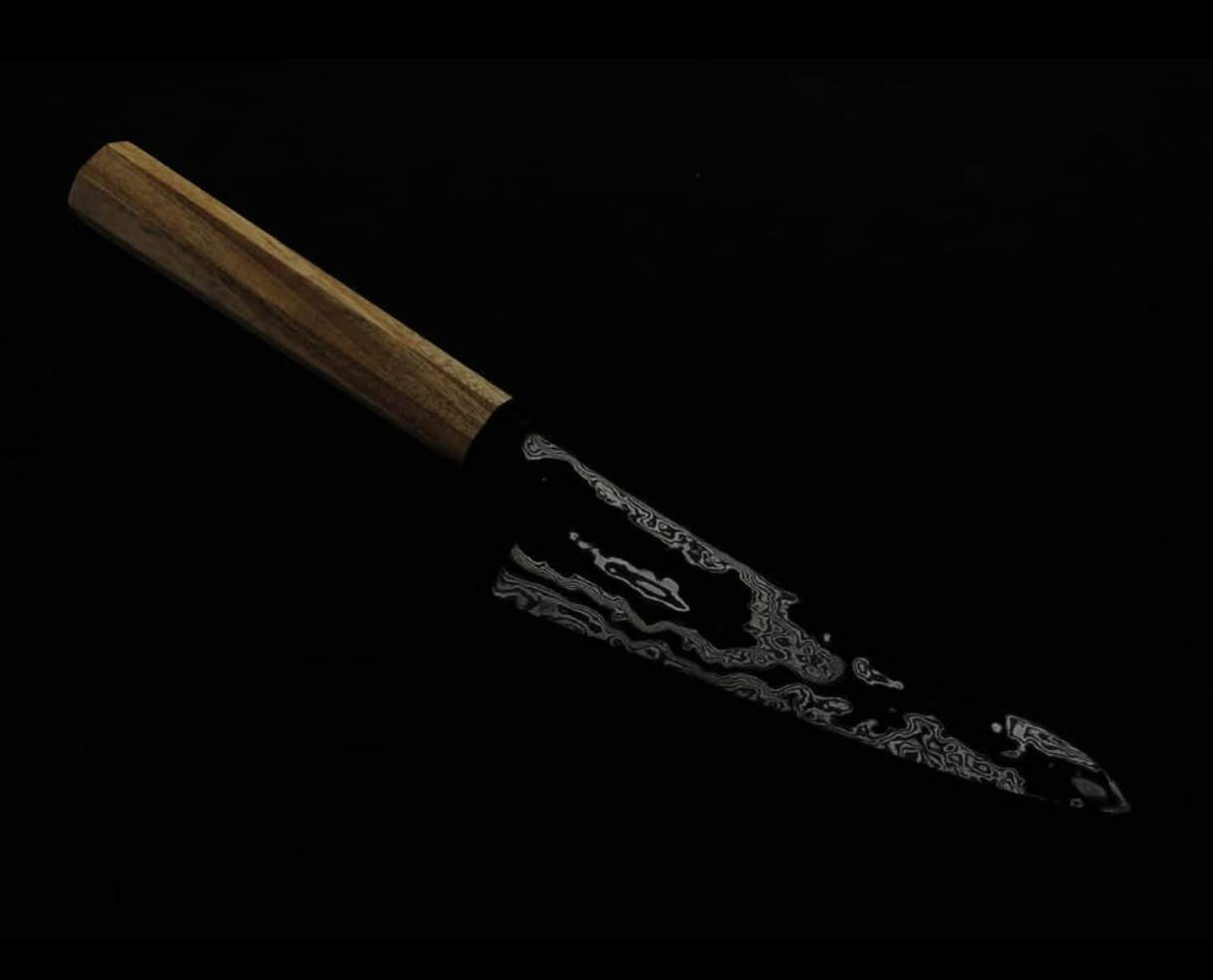 Custom Damascus chef knife with exotic wood handle