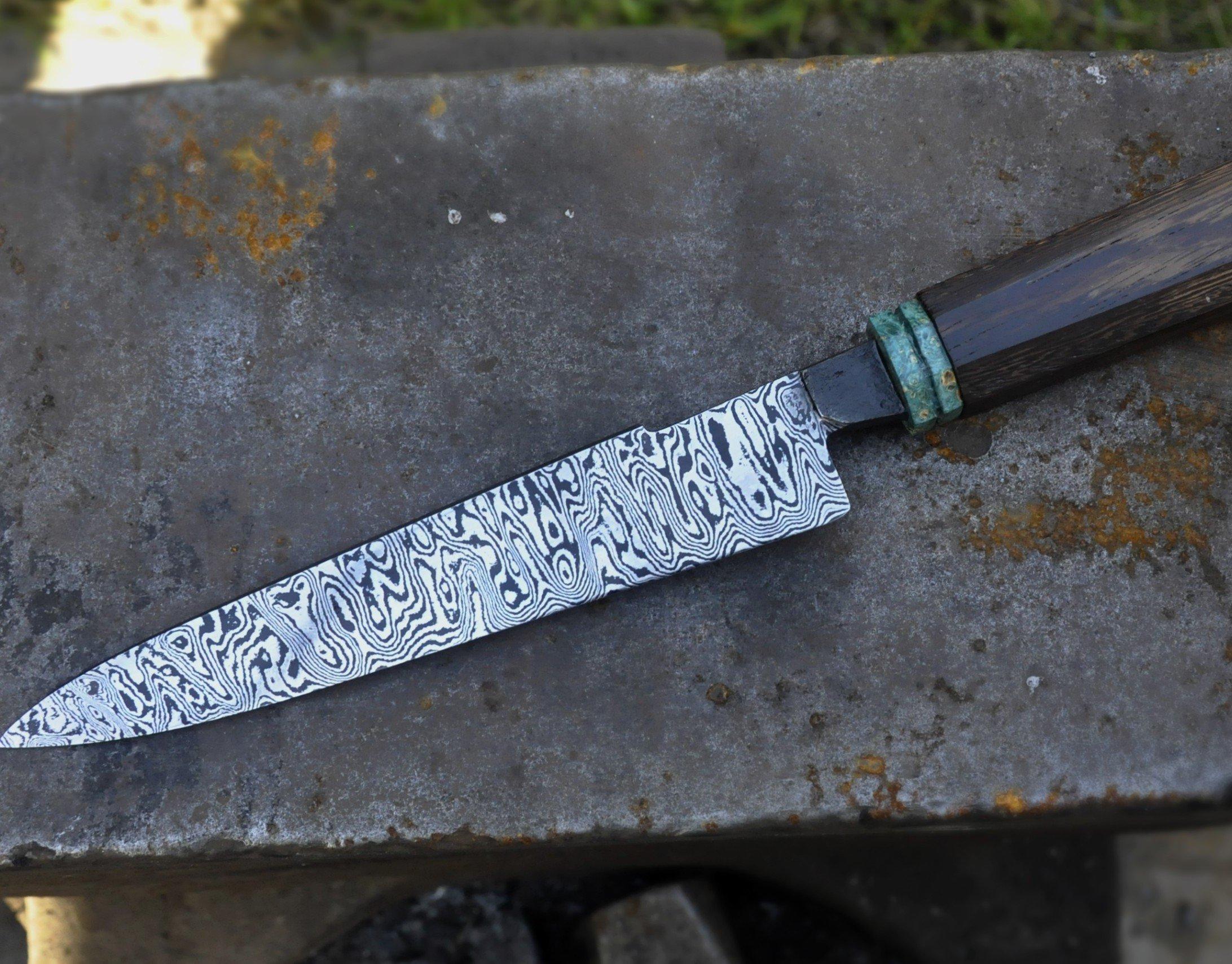 Custom Damascus chef knife with exotic wood handle